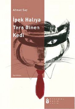 İpek Halıya Ters Binen Kedi İpek Halıya Ters Binen Kedi